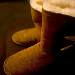Women’s BearPaw size 10 button side flat sole suede boots.